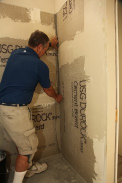 Apply heavy-duty mesh tape to the corners, as well as to the seams between the boards. 