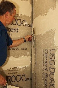 Spread a coat of thinset mortar over all the seams before beginning the tile installation. 
