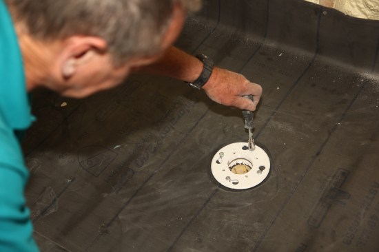 Slip the clamping ring into place and tighten the bolts incrementally, alternating sides until they are all tight. 