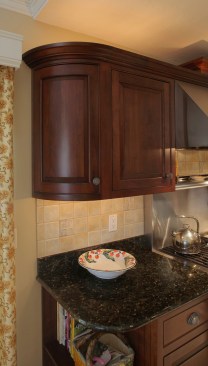 Uplighting above cabinets creates a different accent light in the kitchen.