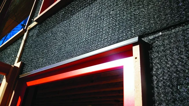 Siding nails directly over commercially available rainscreen materials like this mesh.