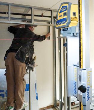 With no structural loads to worry about, the new partition walls were quickly framed with steel studs.