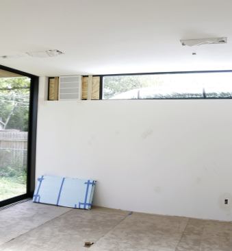 This heat-pump duct is also run through a temporary opening.