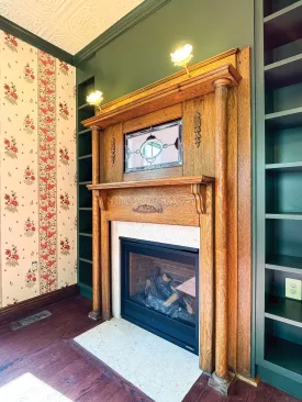 The wall coverings and built in cabinets while all new capture the feel of the original home. 