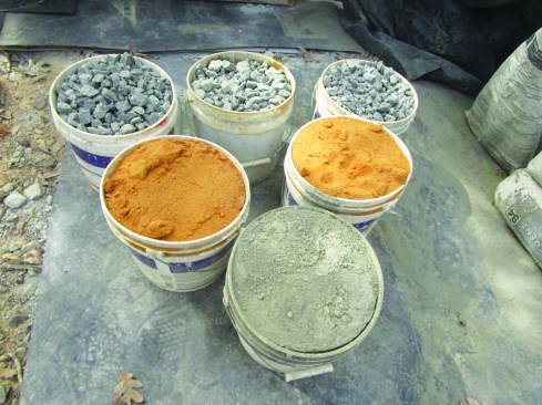 Mixing concrete from scratch involves the combination of portland cement, sand, coarse aggregate (crushed and graded
stone), and water. The industry standard uses a 1-2-3 formula with one part portland cement, two parts sand, and three parts
aggregate for a 4,500-psi mix.