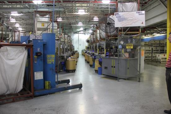 Automated machinery installs springs in the plastic bodies. Parts of this equipment were custom-made so the folks from IDEAL would not allow me to take photos from any closer than this. I did get to see how the operation is performed and it was basically a bunch of gizmos pressing springs into plastic bodies.