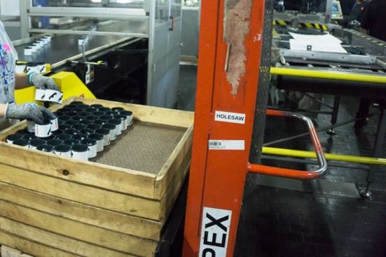 After heat treating the hole saws are sent to a machine that paints them an applies (prints) the company logo. One of the unique things about Lenox is that they only paint the outside of the hole saw. The inside is raw steel—which reduces friction and the likelihood of gumming during use.