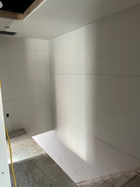 Drywall is installed as normal.