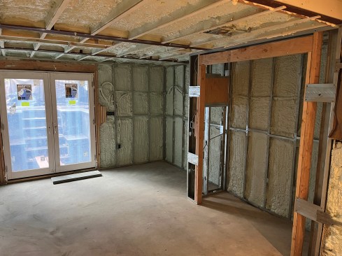 The new basement area was insulated and later finished.