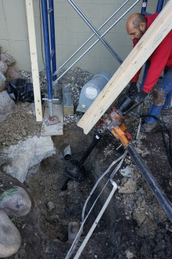 Here is the pier that landed exactly where a waste drain pipe ran, so a section of that pipe was removed.