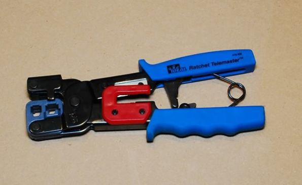 After removing the jacket from data wire and sorting the wire pairs I use this tool to trim the wires to length and crimp RJ45 or RJ11 terminations onto them. It’s a matter of poking the wire into the back of the jack (the termination) and using the ratcheting action of the handles to crimp it on. When the crimp is made pins in the Telemaster drive the knife bars in the termination into the wires so electrical connections are made.