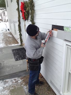 A bead of caulk on the butt end of the clapboard provides further protection.
