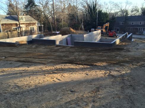 Another use for the skid steer is for maintaining a slope away from the house.