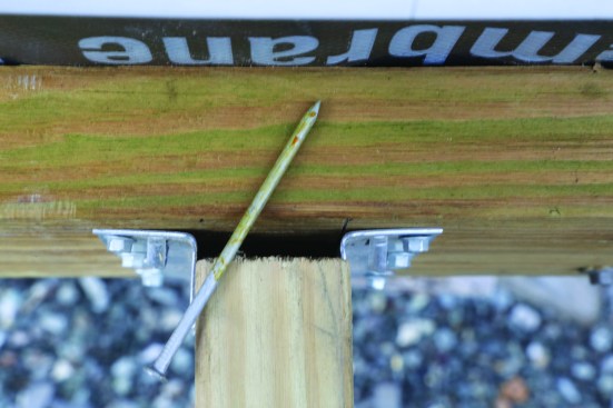 This reduces the joist hanger’s uplift capacity.