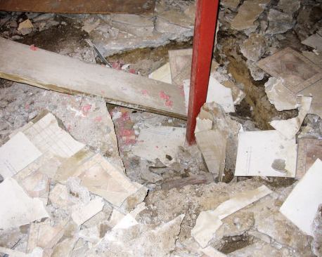 Before we could excavate for the footings, though, we needed to break through the slab at these locations with a rented jackhammer.