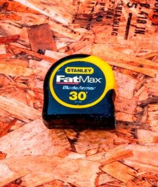I use a 30’ Fat Max 30’. It has a long stand out and unlike the 35’ model is not too large to fit in my bags. Framing is hard on tapes and this one is pretty durable. During the dry part of the year I’ll get 6 or 7 months out of a FatMax tape. This time of year it rains all the time and tapes don’t last more than a month or two. Once enough mud and grit are pulled into the case that’s it for the tape.