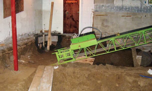 The three-man crew shoveled out another 17 to 18 inches of soil (approximately 50 cubic yards), a process that took three days of hard work.