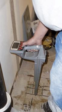 Unlike a wheeled scanner, his handheld scanner can’t map results or plot exact depths, but it can get closer to walls.