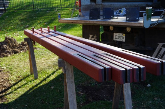The four high-strength-steel (HSS) diagonal columns were fabricated with slots at one end of the columns. These slots will slip over the existing flitchplates on the house.