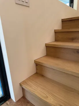 A consistent and clean reveal is created along the stairs.