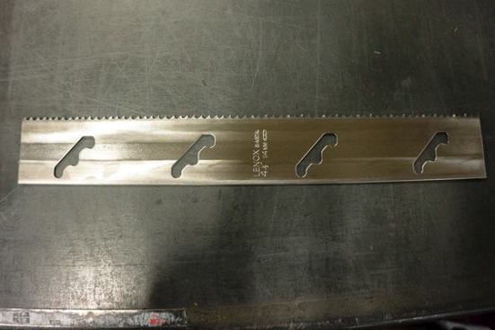 This stamped steel blade is ready to be formed into a hole saw.