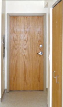 he location of an existing drain made it impossible to provide a full 5-foot clear floor space at the entry inside the apartment.