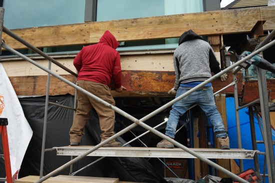 The flitch plates running along the bottom of the gable end were cut and removed in sections.