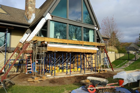 A new LVL beam to support a new rim joist was installed.