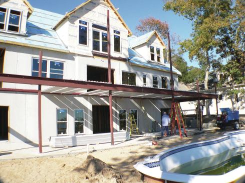 Once the framing is complete, the panels are laid in place.