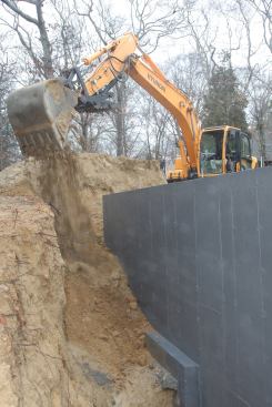 ... to backfill the area excavated for the foundation.