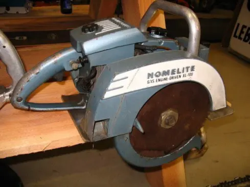 Here's Wayne's saw from the front. Homelite was not the only company that made gas-powered circular saws. A company called Piston Powered Products made one (the Super Saw) for a brief period of time in the 1970s.
