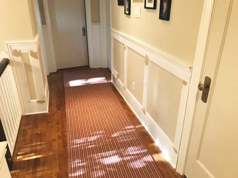 In this example the material applied to the wall for the stiles and rails has a profiled edge on both sides.