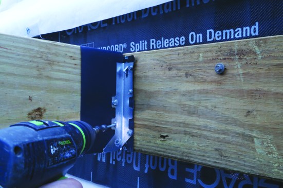 This reduces the rate of galvanic reaction between the treated lumber and the metal hanger.