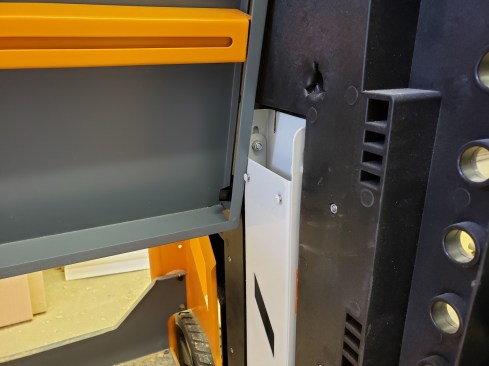 The unit I got needs to be set up on a flat floor so its fold-away top deck can fold away. If not, the frame racking causes pinch points.