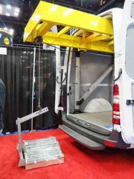 Weightlifter makes lifts for trucks and vans. This is their newest van model, which is so new it doesn’t have a name. Powered by electricity and hydraulics it is capable of lifting more than 1,000 pounds. It installs using existing holes in the floor of the van and can be configured to fit many makes and models.
Click here to see this gizmo in action.