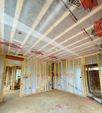 The netting on the top-floor ceilings will be used to contain dense-packed Greenfiber Sanctuary cellulose for sound attenuation.
