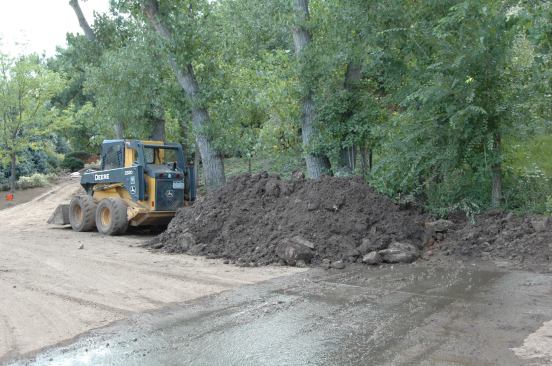 A section of this mountainside gave way in a mudslide after the soil was oversaturated with record amounts of rainfall. It’s not clear whether soil from the slide inundated the nearest residential property a few hundred yards below or if an adjacent irrigation ditch was to blame.