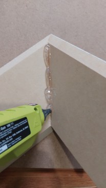 A bead of hot glue adds strength to the outside miter after the joint is preset. This added step allows some flexibility to the joint during installation and helps prevent separation over time.