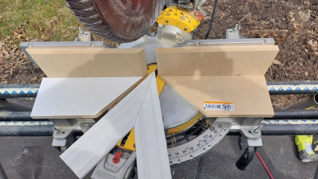 Cutting a 45 on the end of the board first makes getting sharper miters easier.