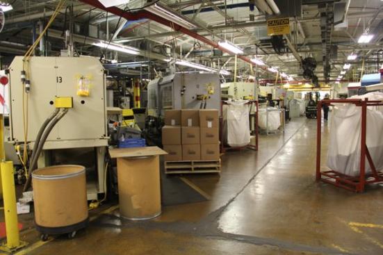 The first thing you see upon entering the plant is a long row of injection molding machines that make the plastic outer bodies of WIRE-NUT connectors.