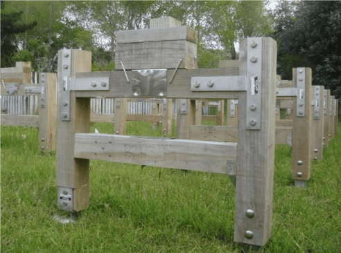 In the BRANZ study, a number of  gate-shaped structures were built of CCA-, ACQ-, and CA-treated timbers using mild steel, galvanized steel, and stainless steel hardware commonly used for building and construction. The structures were erected in two locations to evaluate the corrosivity of the various combinations of preservative, environment, and exposure.