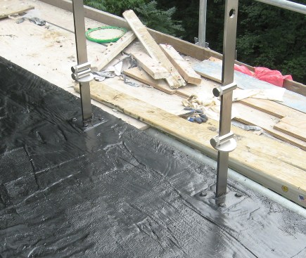 After the bases were installed, the deck was waterproofed.