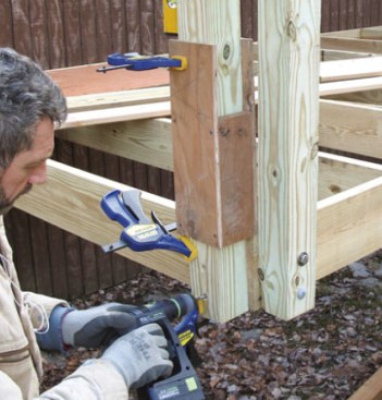 A sitebuilt jig ensures accurate hole placement. The author marks the hole locations with a nail set.