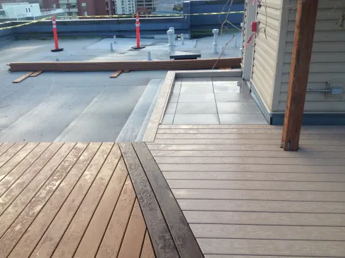 The tile on this access ramp is supported by Bison Versadjust pedastals.