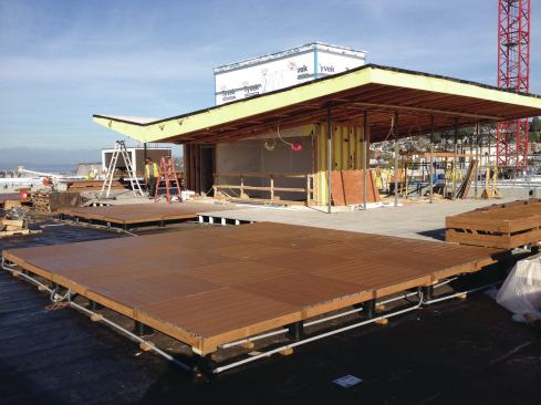 Once installed on top of the pedestals, the grids were fastened together with long structural screws.