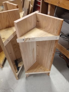 Reusable corner blocks kept each assembly square while the glue dried.