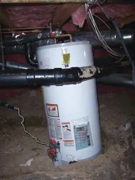 Even if a full-height water heater fits within the vertical limitations of a crawlspace, the installation may not meet code.