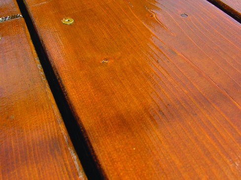 After removing the old finish and refinishing with Cetol Dek, the cedar decking looks just like new.
