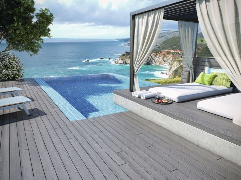 The substrate in Deckorators' Vault decking is made with a proprietary technology called "Eovations" that the manufacturer claims has the industry's best strength-to-weight ratio. Weight per unit of volume is about that of PVC decking—35% less than standard composites—but it's stiffer and stronger, according to the company. The proprietary extrusion/drawing process creates a molecularly-oriented internal structure that actually has a grain and, like wood, is stronger across than parallel to the grain. The boards are capped with a polypropylene capstock that comes in two colors with a fairly flat sheen. 