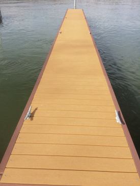 A Tennessee dock-builder finds that today's uncapped decking stays mildew free even in a damp environment. As with all decking, however, it does need a yearly cleaning.